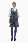 Flared dress with side pockets made of fancy denim