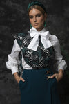 Short wool-crêpe skirt with buckle details