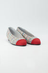 Ballerina mit buntem Tweed bezogen
