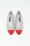 Ballerina mit buntem Tweed bezogen