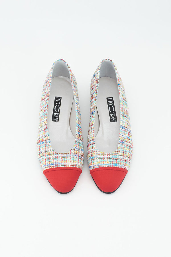 Ballerina mit buntem Tweed bezogen