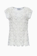 Top made from white effect fabric