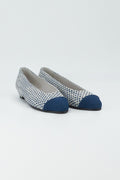 Ballerina covered in blue and white tweed