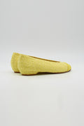 Ballerina mit gelbem Tweed bezogen