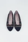 Ballerina mit buntem Tweed bezogen