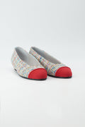 Ballerina mit buntem Tweed bezogen